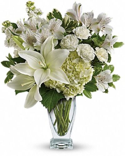 <p>Show the depth of your love with a bouquet that speaks through grace, simplicity, and quiet elegance. This all-white arrangement captures the essence of sincere emotion, offering a timeless symbol of admiration, remembrance, or heartfelt connection. Designed to bring comfort or celebration, it creates a lasting impression with every delicate bloom.</p>
<p>The bouquet features a blend of pure white hydrangea, Asiatic lilies, alstroemeria, miniature carnations, and stock. Accents of green pittosporum provide natural contrast and texture, highlighting the softness of the blooms while adding depth to the design. Each stem is thoughtfully arranged in a sleek, modern vase that complements the arrangement's refined silhouette and understated beauty.</p>
<p>Ideal for anniversaries, weddings, sympathy offerings, or meaningful everyday gestures, this bouquet is a versatile expression of love and support. Its monochromatic color palette brings a calming presence to any space, while the fresh fragrance and graceful form make it a fitting choice for a wide range of occasions. It’s a way to say “you matter” with gentle strength and timeless style.</p>
<p>Every arrangement is handcrafted using fresh, high-quality flowers, ensuring each piece reflects care, balance, and intention. Because designs are made to order, bloom varieties may vary slightly based on availability, but the serene look and elegant tone of the bouquet always remain true. The finished presentation offers a clean, polished look that blends easily into modern or traditional settings.</p>
<p>Let this arrangement deliver your message with quiet beauty and emotional clarity. With its soft tones, fresh fragrance, and thoughtful design, it becomes more than just a bouquet—it’s a gesture of pure love, expressed through nature’s most elegant forms.</p>